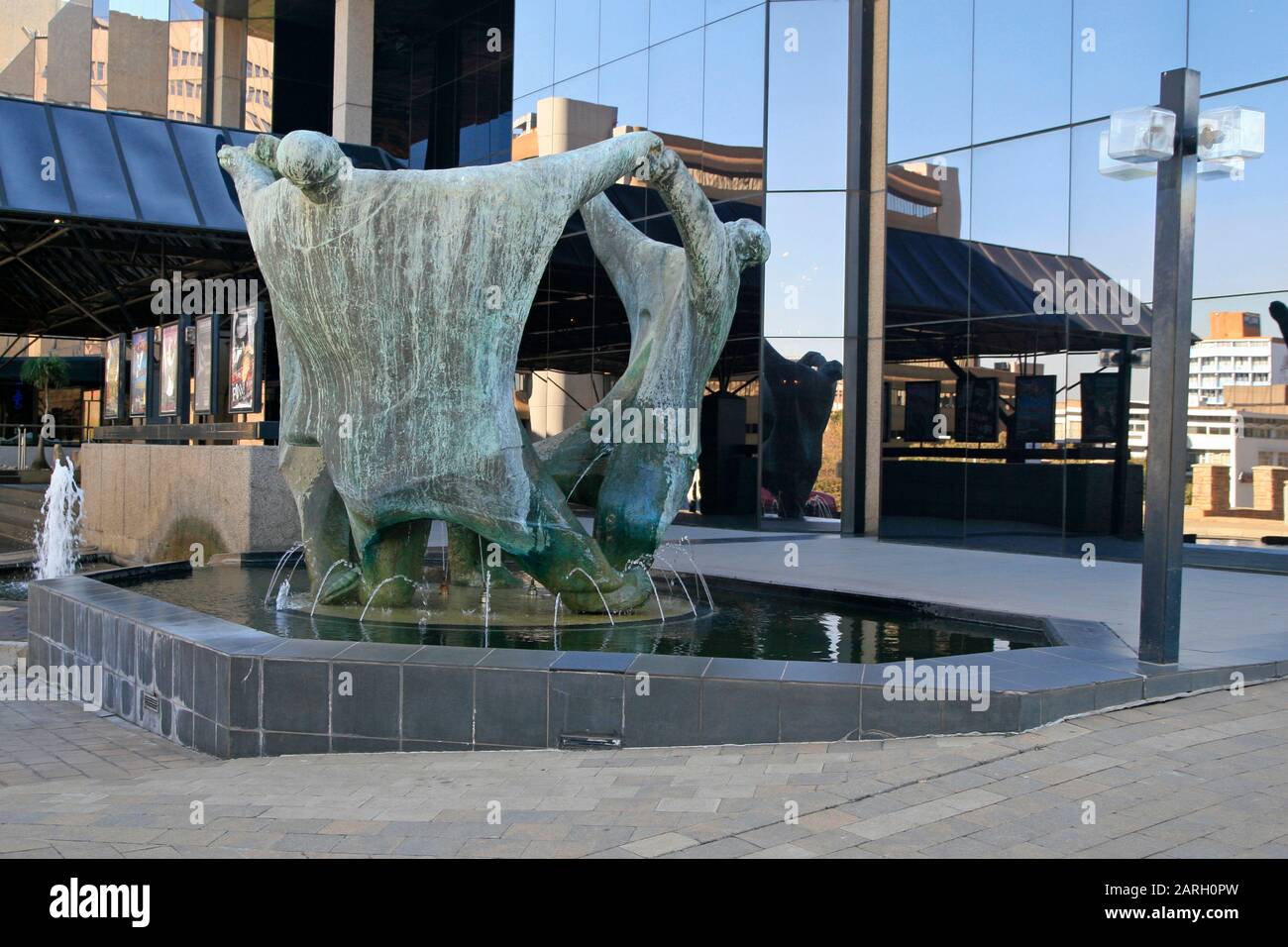 Statues in front of Joburg Theatre called The Playmakers by Ernest Ullman, Braamfontein, Johannesburg, Gauteng, South Africa. Stock Photo
