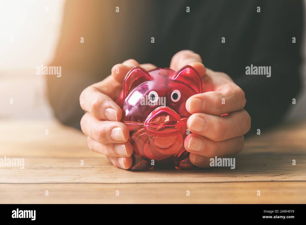 retirement savings concept - senior woman holding piggy bank Stock ...