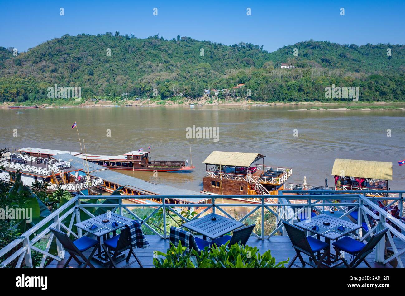 Boats on the Mekong river, Luang Prabang, Laos Stock Photo