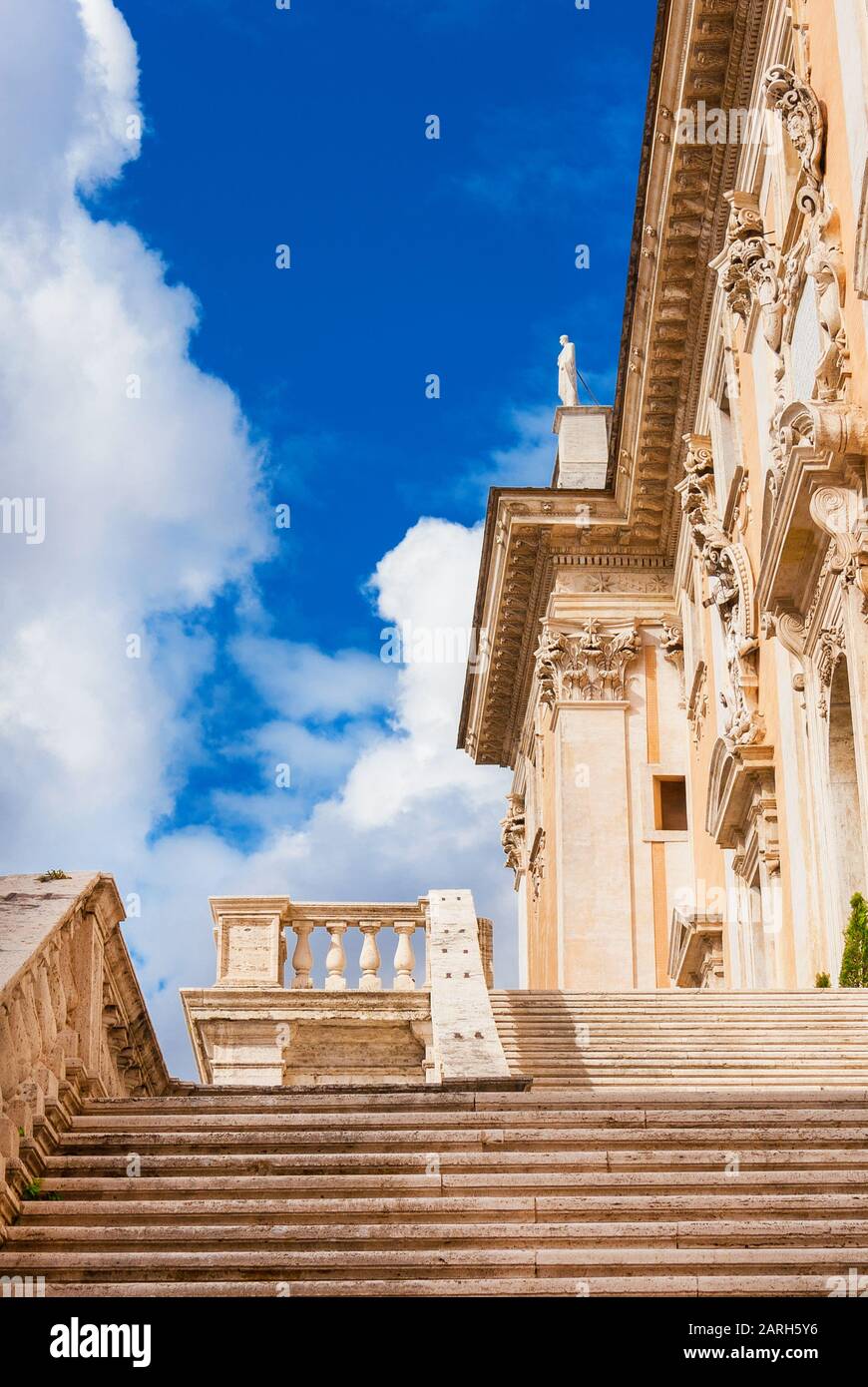 Rome City Hall staircase with clouds at the top of Capitoline Hill in the center of Rome, designed by the famoud renaissance artist Michelangelo in th Stock Photo