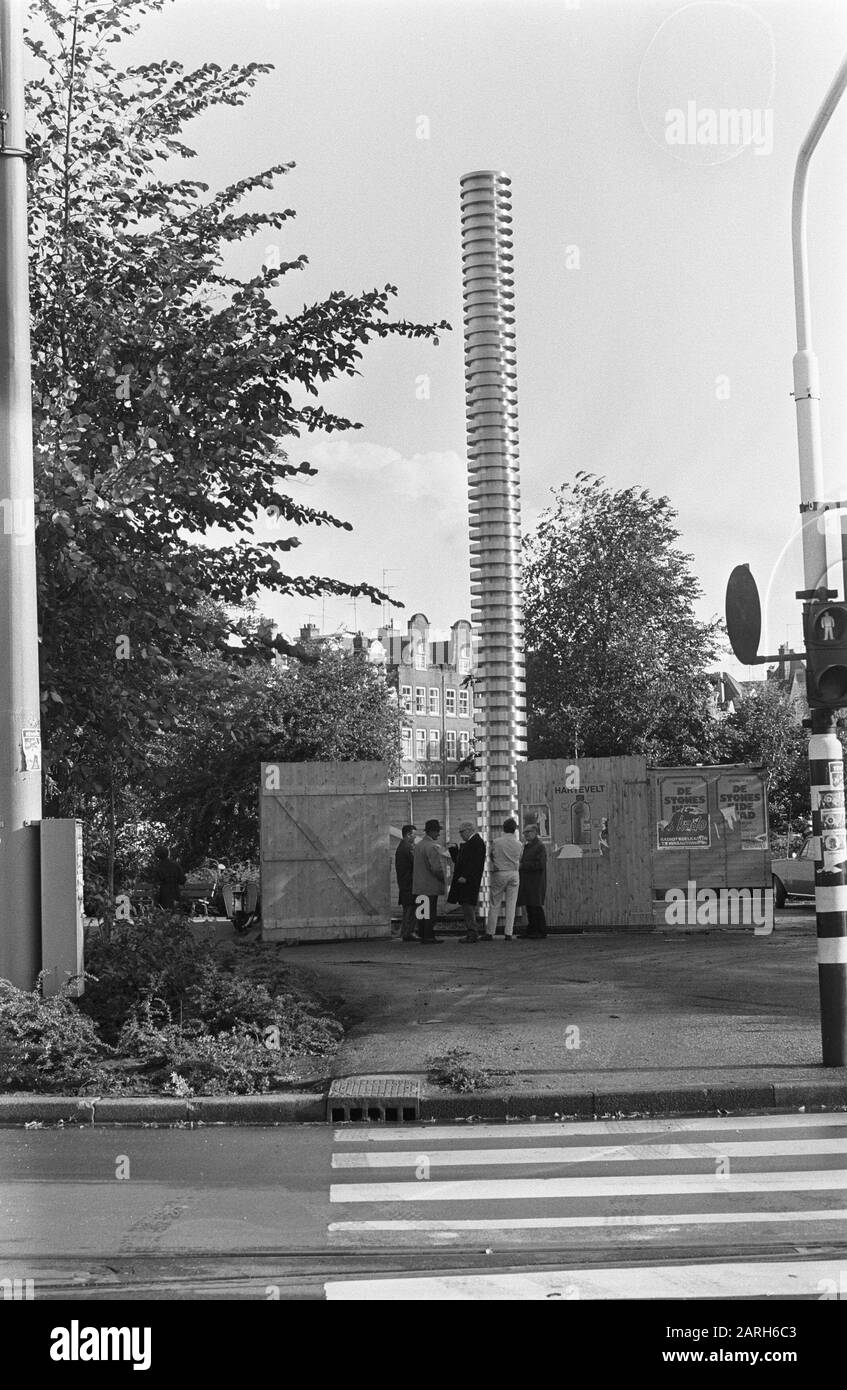 Winkler Prins Monument by Andre Volten is placed at Frederiksplein, Amsterdam; monument with part of fence Date: October 2, 1970 Location: Amsterdam, Noord-Holland Keywords: monuments Institution name: Winkler Prins Monument Stock Photo