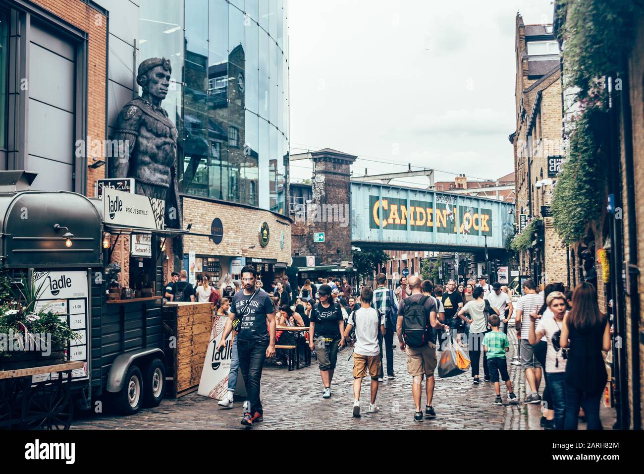 London/UK - July 17, 2019: People walking at Stables Market, located in the historic former Pickfords stables and horse hospital in Camden Town Stock Photo