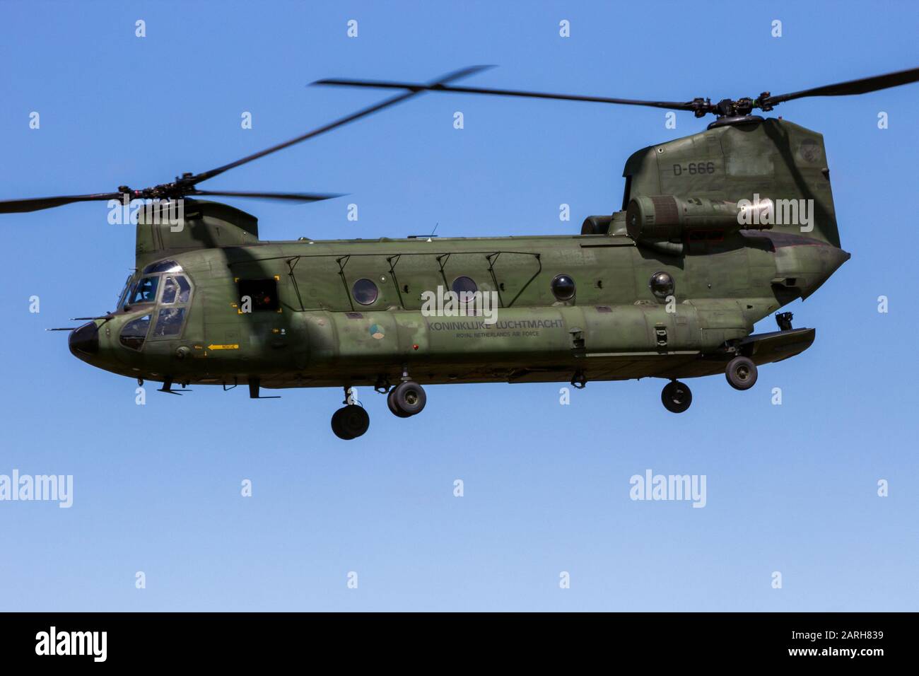 VOLKEL, THE NETHERLANDS - JUN 15, 2013: Royal Netherlands Air Force Boeing CH-47D Chinook transport helicopter in flight. Stock Photo