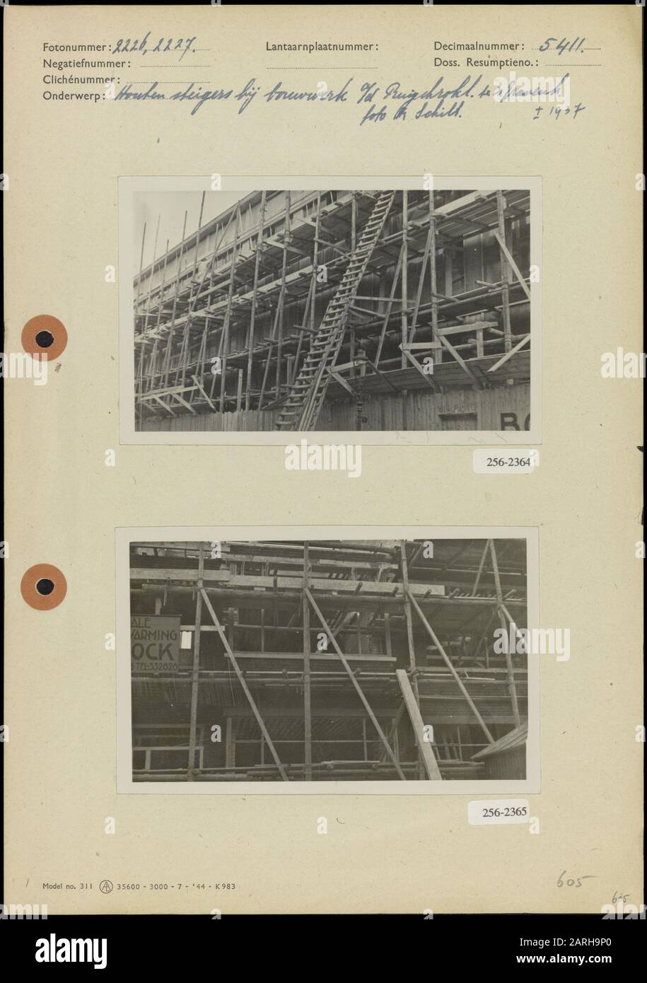Woningbouw Ruychrocklaan in The Hague  Photo 1: Wooden scaffolding near a building on the Ruychrocklaan in 's- Gravenhage (8,5x13,5 cm;  Schilt) Photo 2: Wooden scaffolding near a building on the Ruychrocklaan in The Hague (8,5x13,5 cm;  Schilt) Date: 1937 Location: The Hague, Zuid-Holland Keywords: construction activities, scaffolding, housing Stock Photo