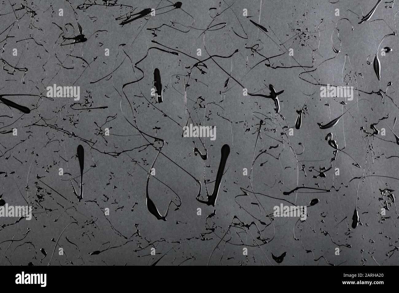 Black Matte Background With Splashes And Drops Of Glossy Black Paint Stock Photo Alamy