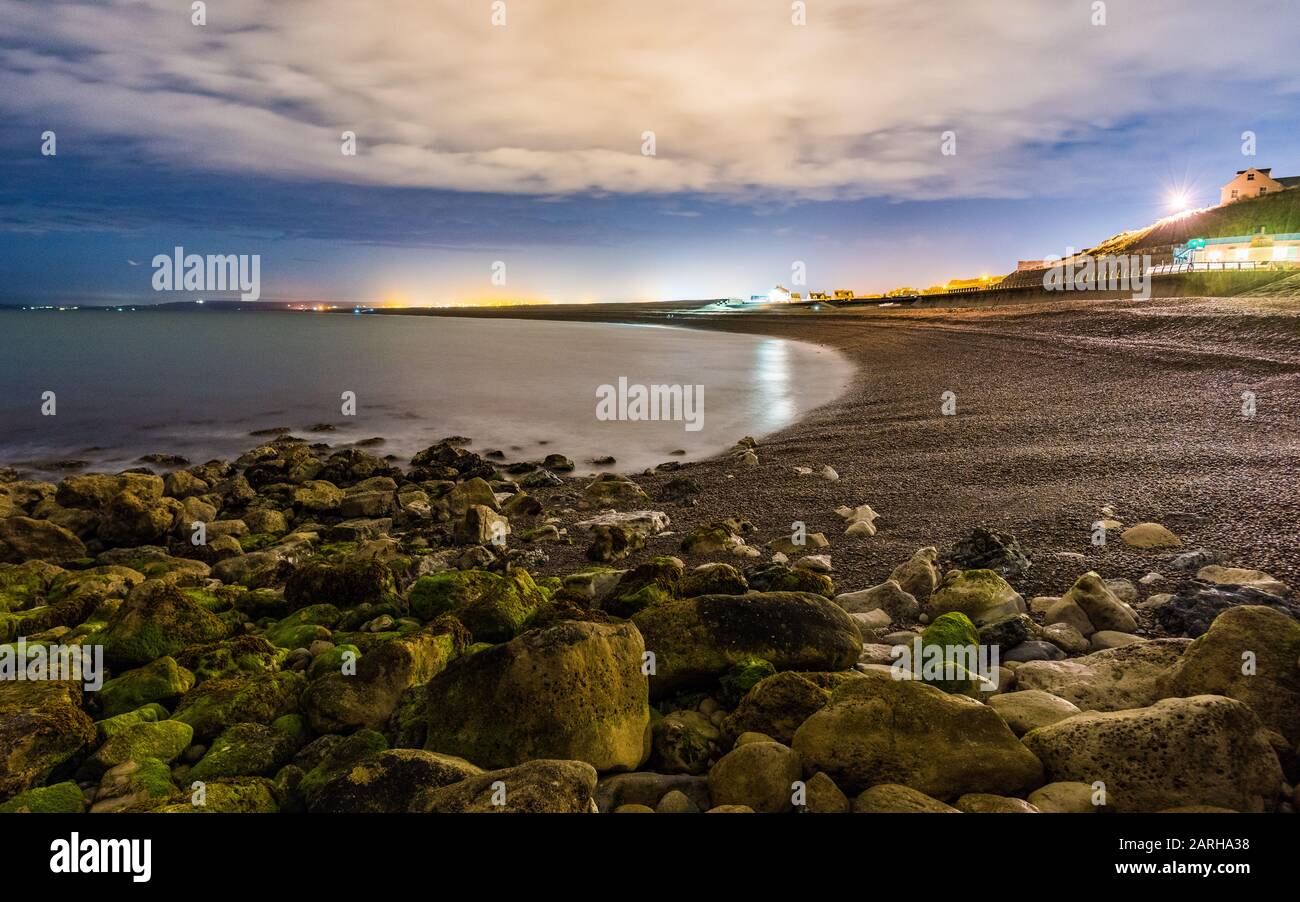 Chesil cove and Chesil beach at night Stock Photo
