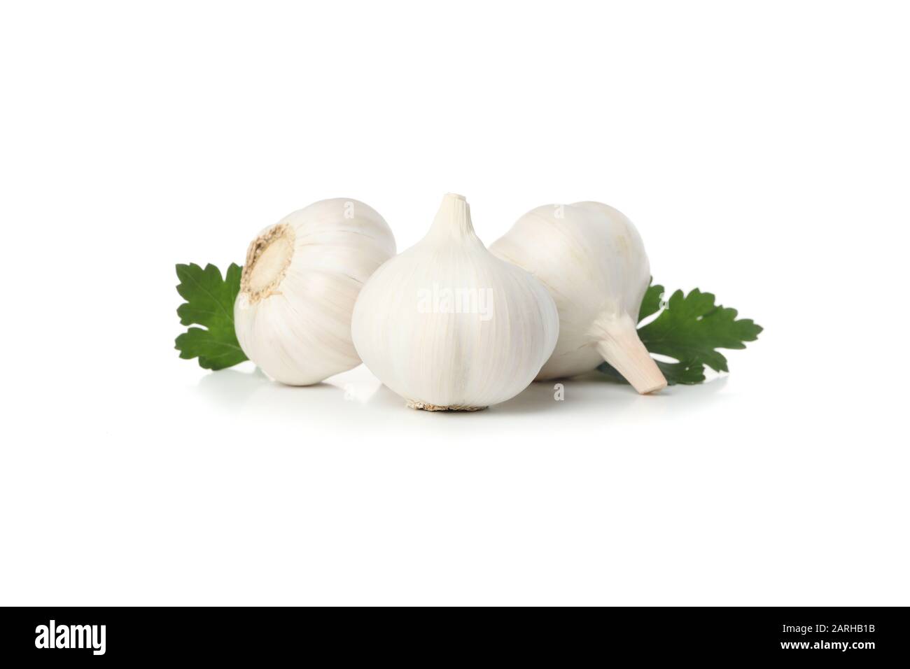 Fresh garlic bulbs and parsley isolated on white background Stock Photo ...