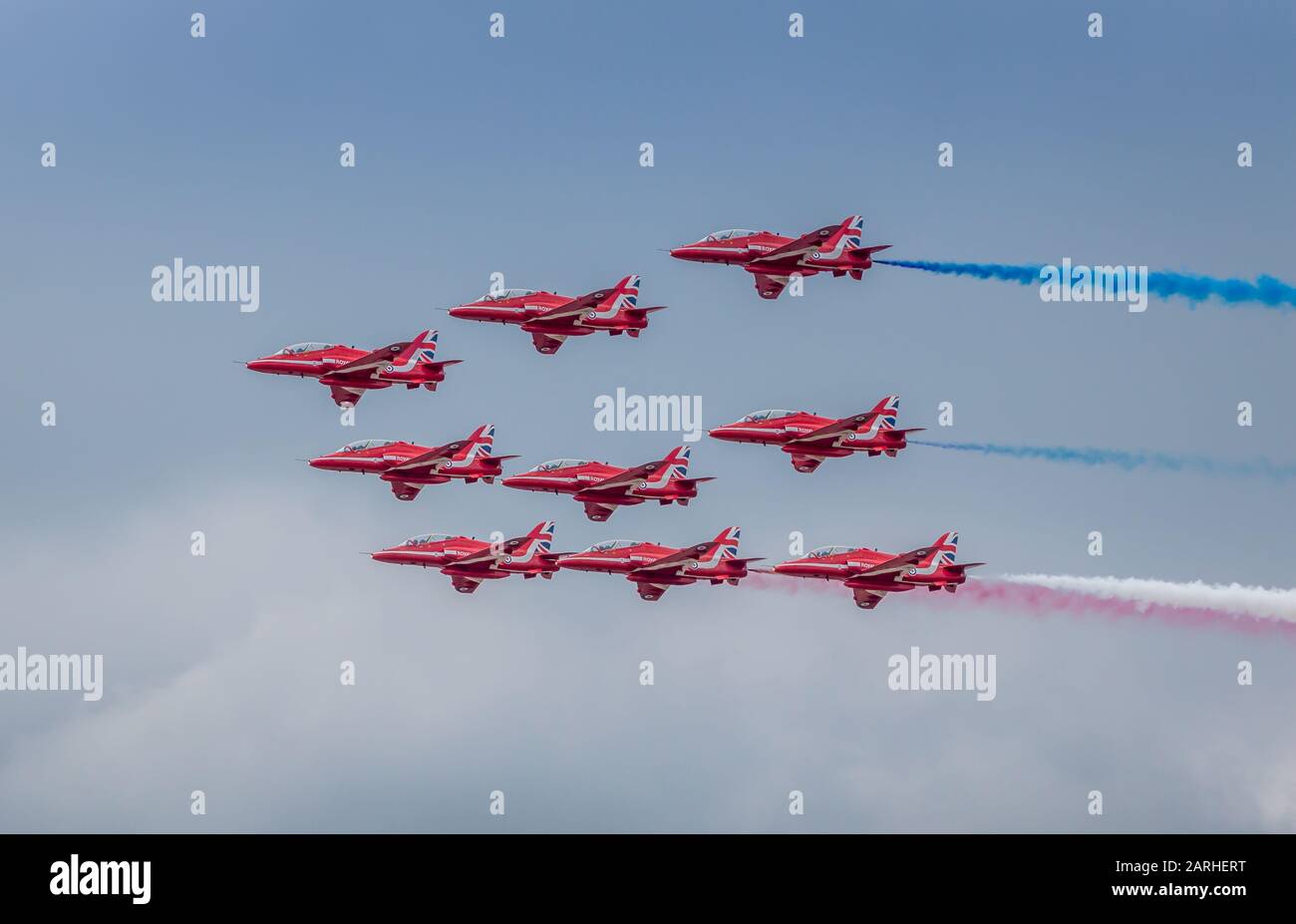 The British Royal Air Force Red Arrows Display Team Flying In BAE Hawk the-british-royal-air-force-red-arrows-display-team-flying-in-bae-hawk