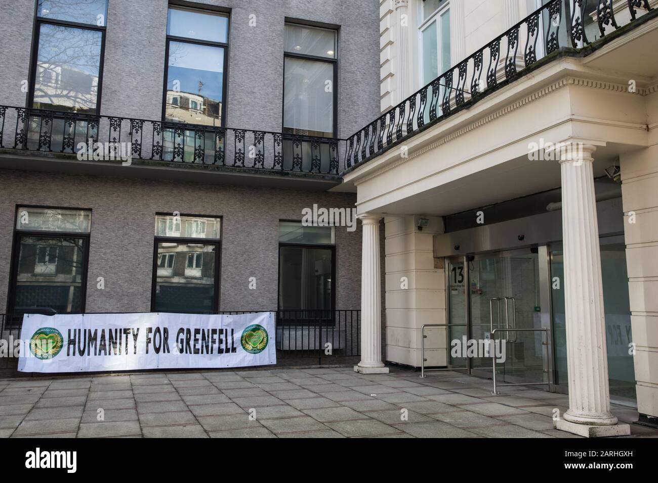 London, UK. 28 January, 2020. A banner bearing the words ‘Humanity for Grenfell’, the name of a community group formed to ‘ensure truth, justice and restitution for all bereaved relatives and survivors of the Grenfell Tower fire’, is displayed outside the venue in Paddington for the second stage of the Grenfell Inquiry which will consider how the high-rise block came to be covered in flammable materials. Credit: Mark Kerrison/Alamy Live News Stock Photo