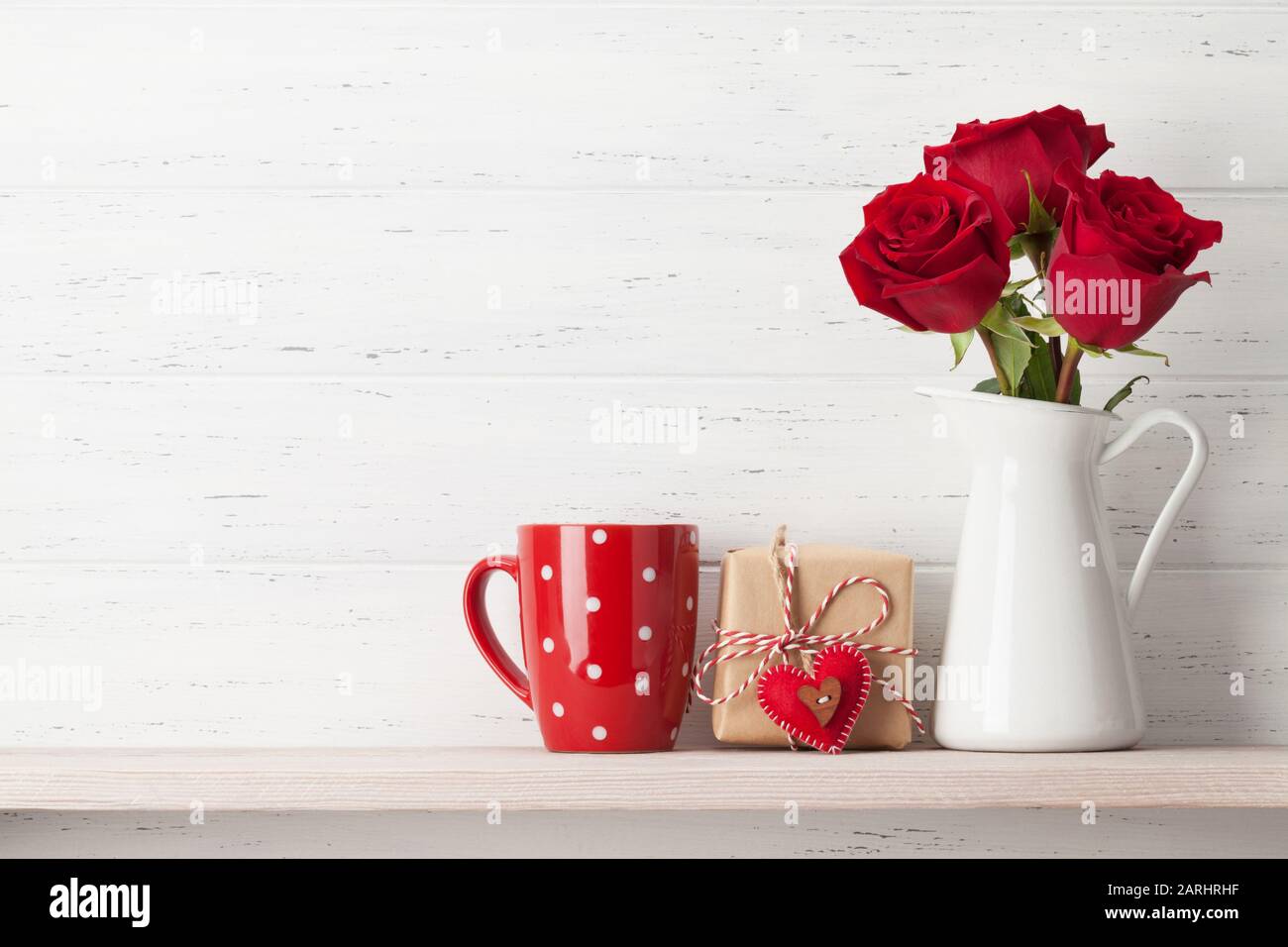 Valentines day greeting card with rose flowers and gift box on white ...