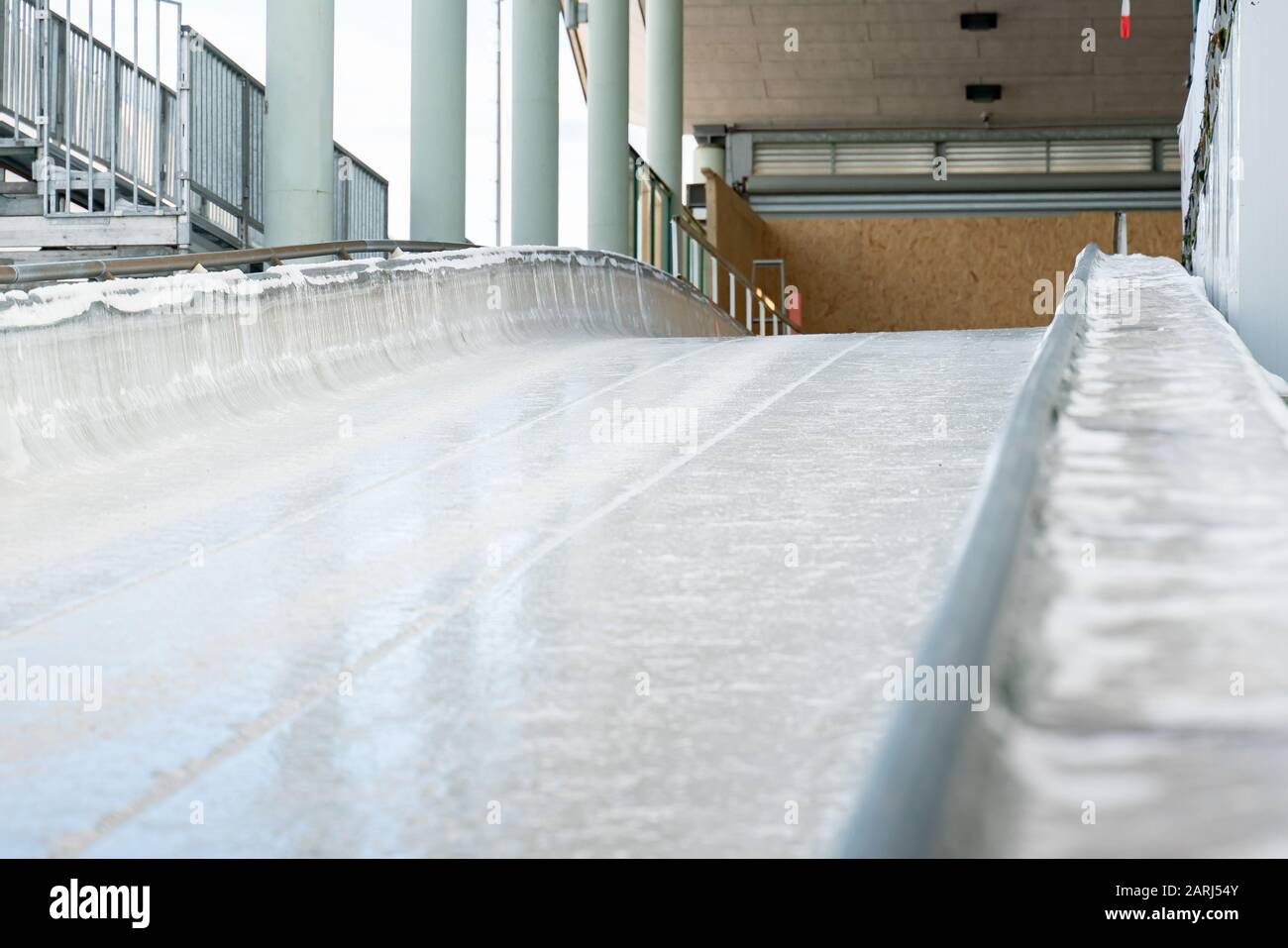 Bobsleigh ice channel in Winterberg. The digital clock measures the speed. start position. Stock Photo