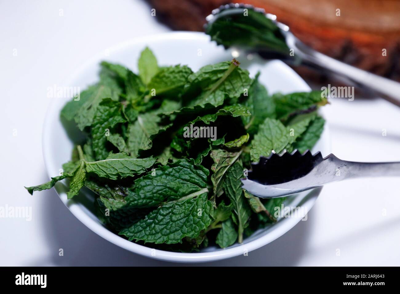 medicinal plant and spice mint leaves Mentha spicata in glass pot Stock Photo