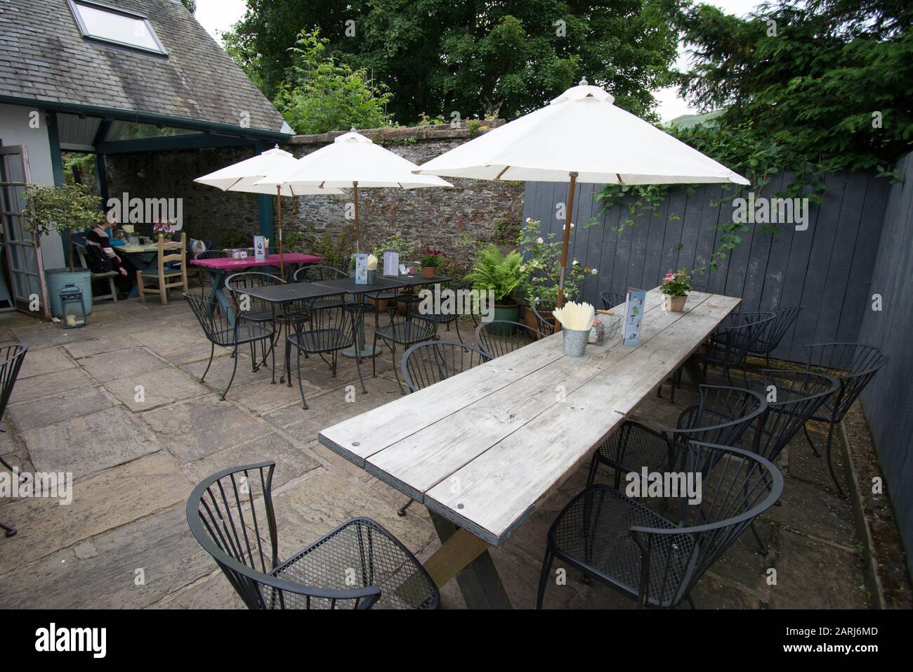 table and chairs in pub garden Luss Scotland table wood oak chairs