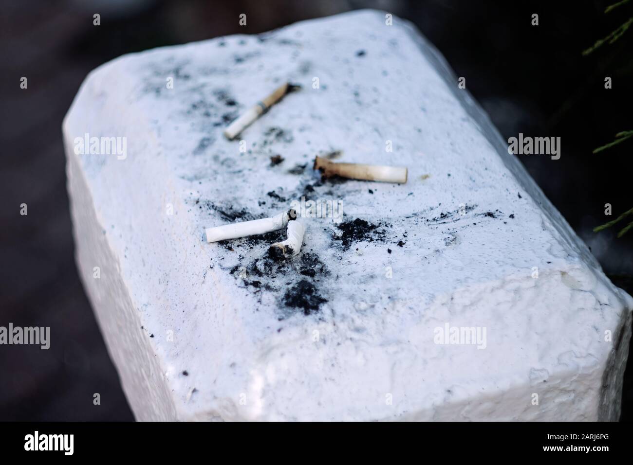 cement cigarette Cigarette ash on concrete hi-res stock photography and images