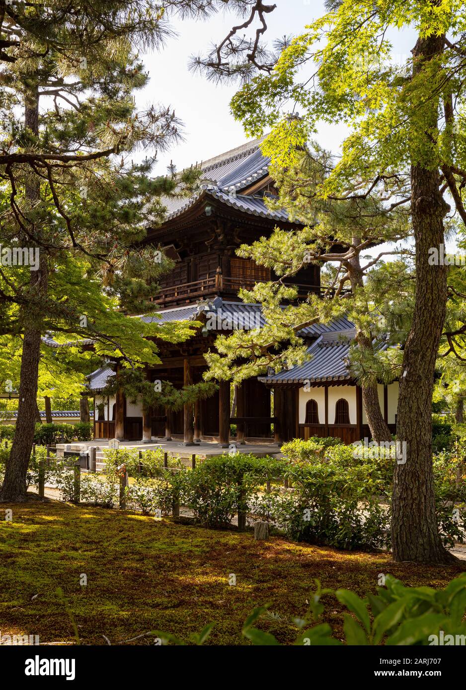 Buddhist temple seen from beautiful Japanese garden Stock Photo