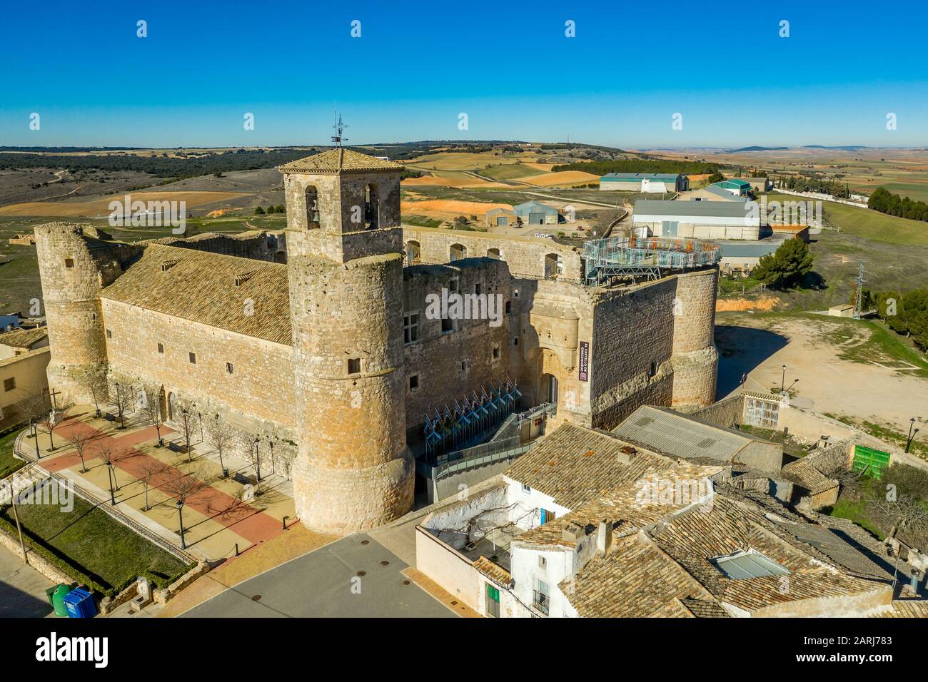 Aerial view of Garcimunoz medieval castle church where ancient architecture meets modern in Spain Stock Photo