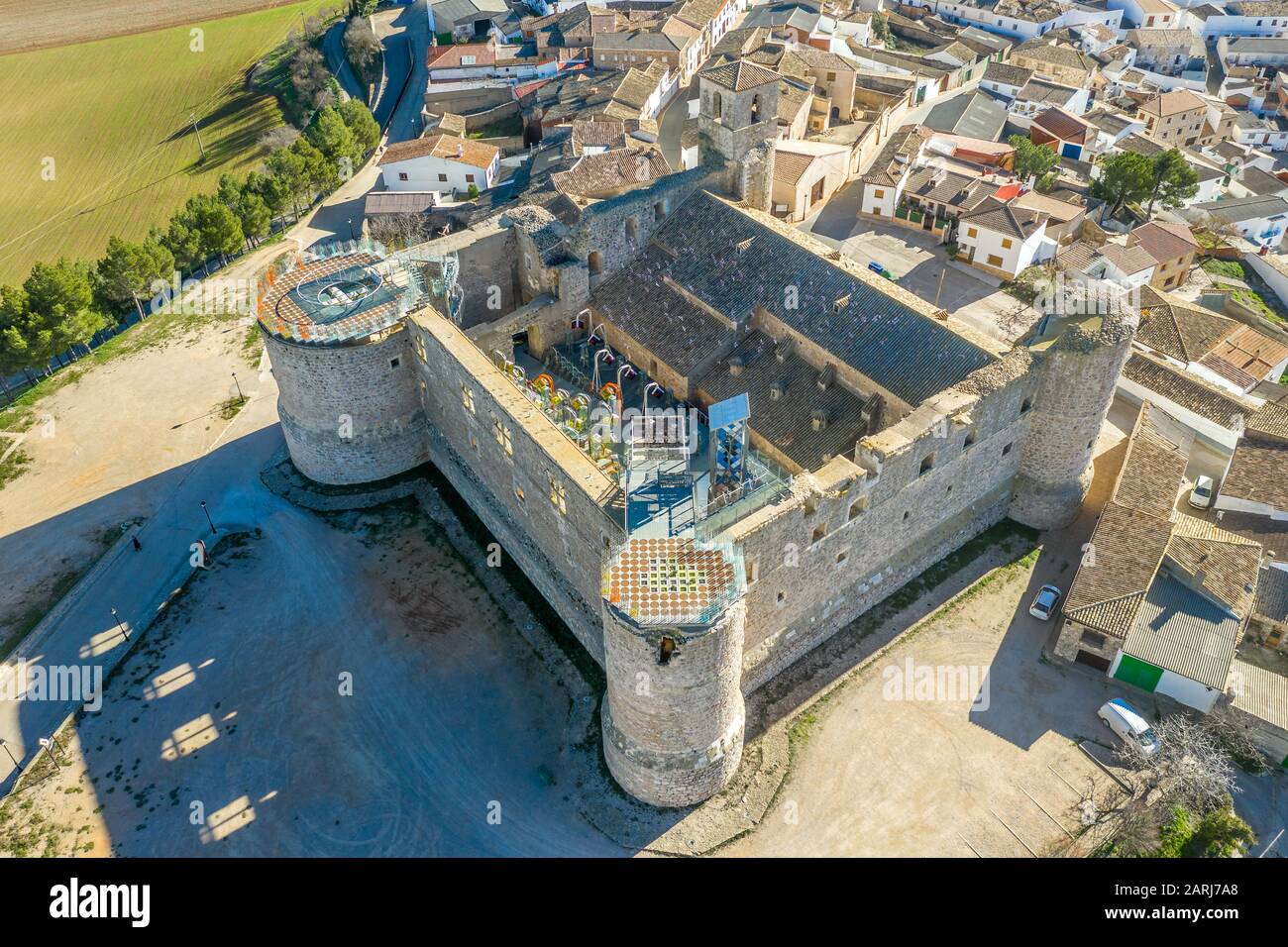 Aerial view of Garcimunoz medieval castle church where ancient architecture meets modern in Spain Stock Photo