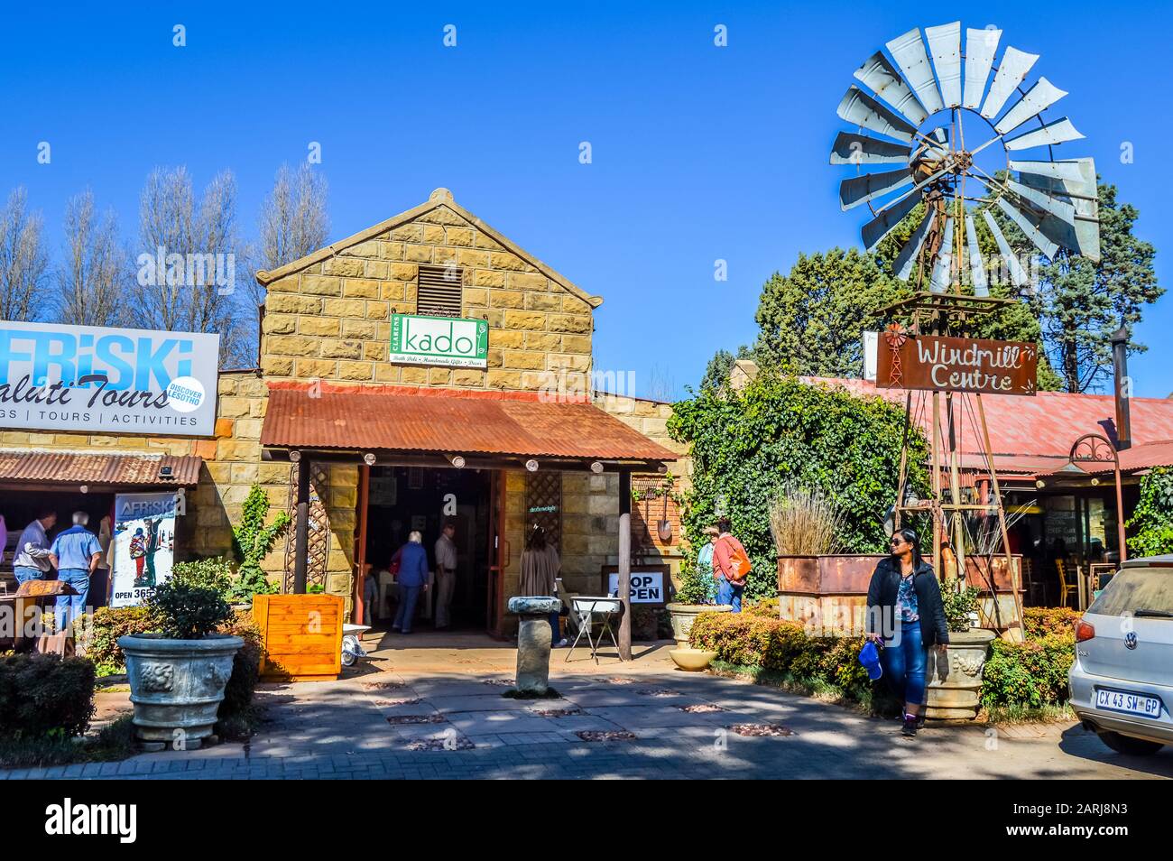 Clarens art and craft shops with windmill on the fore ground in South