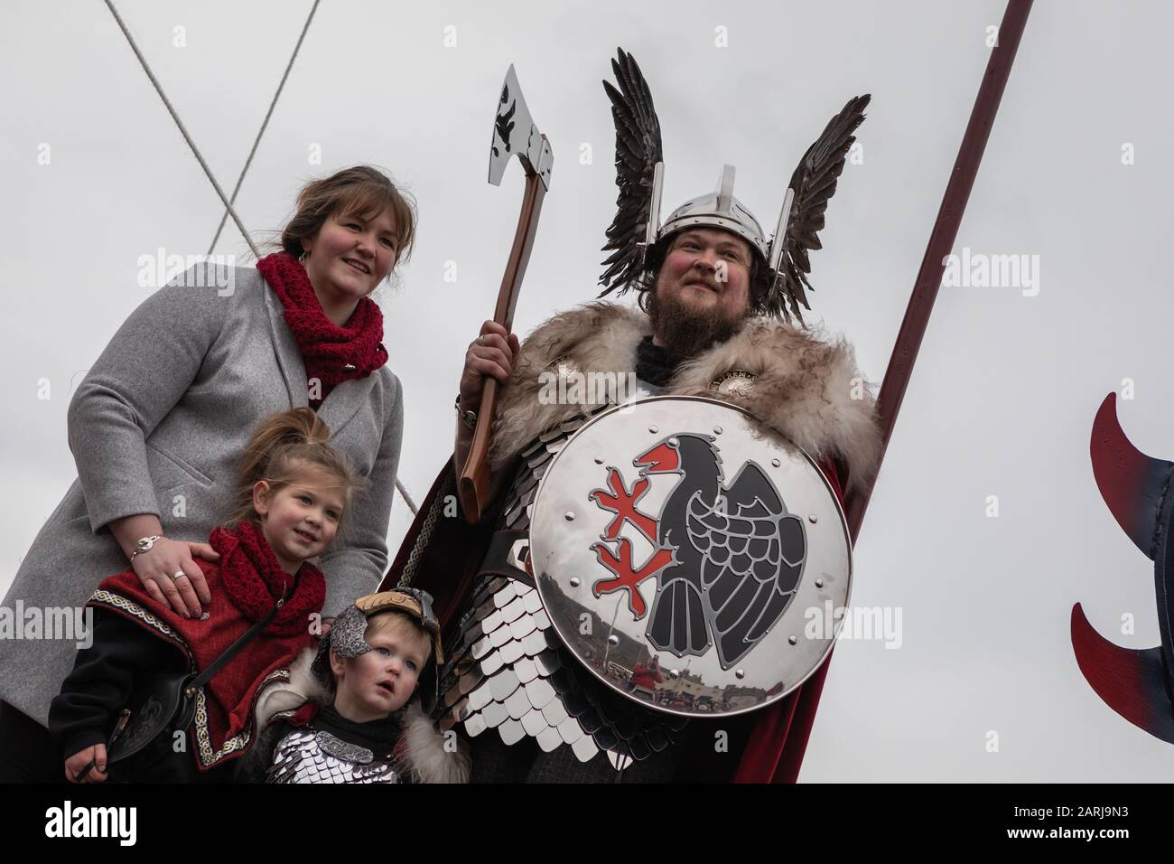 Lerwick, Shetland Isles, Scotland, UK. 28th January 2020. Up Helly Aa 2020 Guizer Jarl Liam Summers, and family, aboard the galley ship of the viking Stock Photo