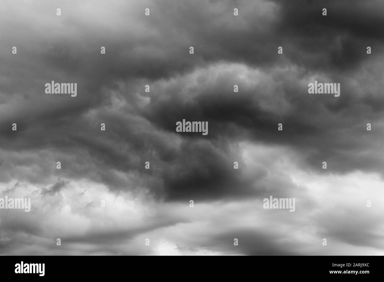 Dark clouds gloomy sky Black and White Stock Photos & Images - Alamy