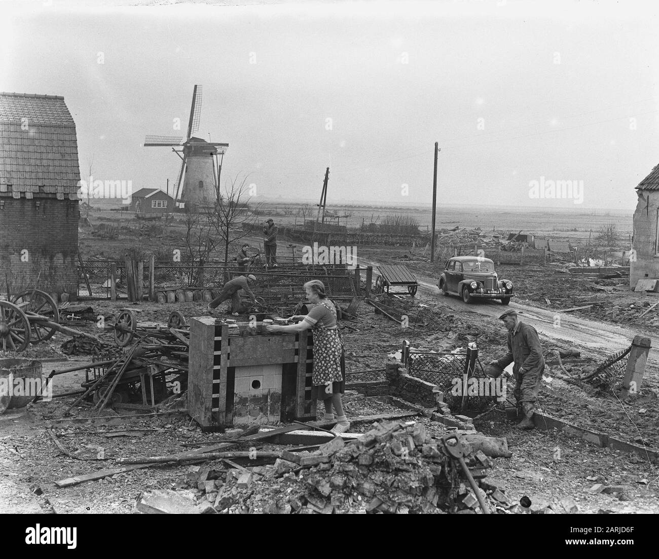 Schouwen Duiveland still sad. Nieuwerkerk Date: 25 March 1954 Location: Nieuwerkerk Keywords: repairs, flood Stock Photo