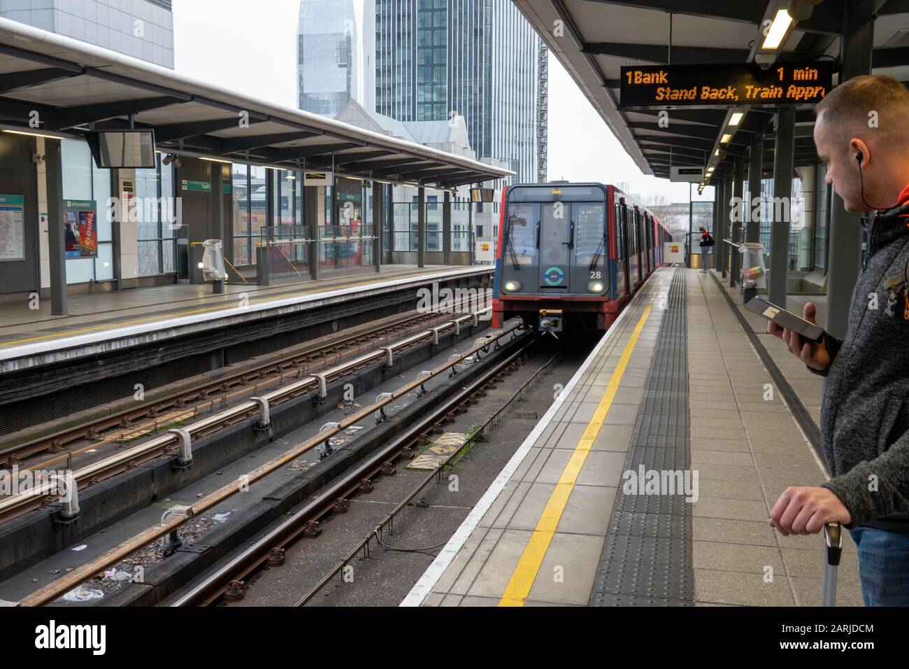 Train arriving at  South Quay, London Docklands Light Railway Stock Photo