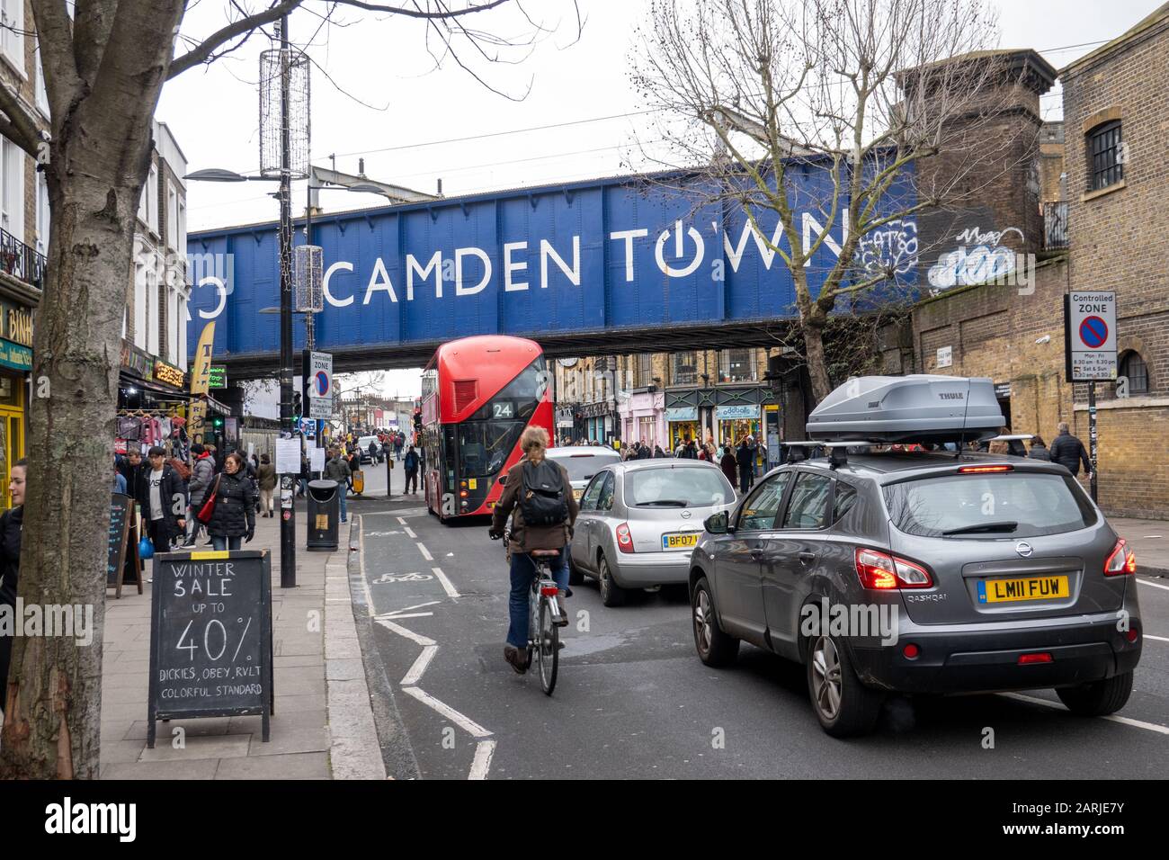 London Bus passes under Camden Town bridge, London, UK Stock Photo Alamy