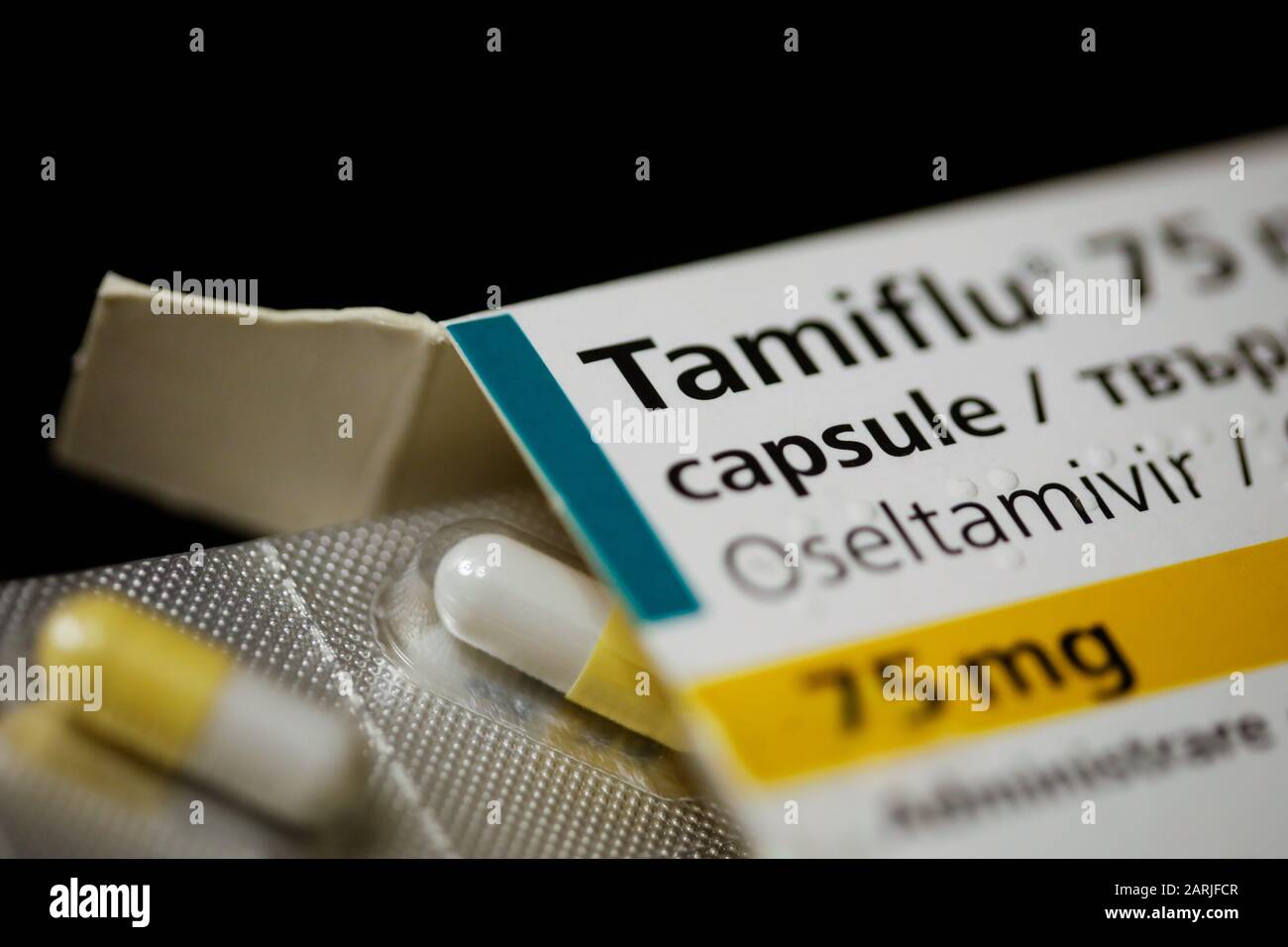 Bucharest, Romania - January 26, 2020: Close up image with a Tamiflu capsule (oseltamivir) on a blister pack, an antiviral medication that blocks the Stock Photo