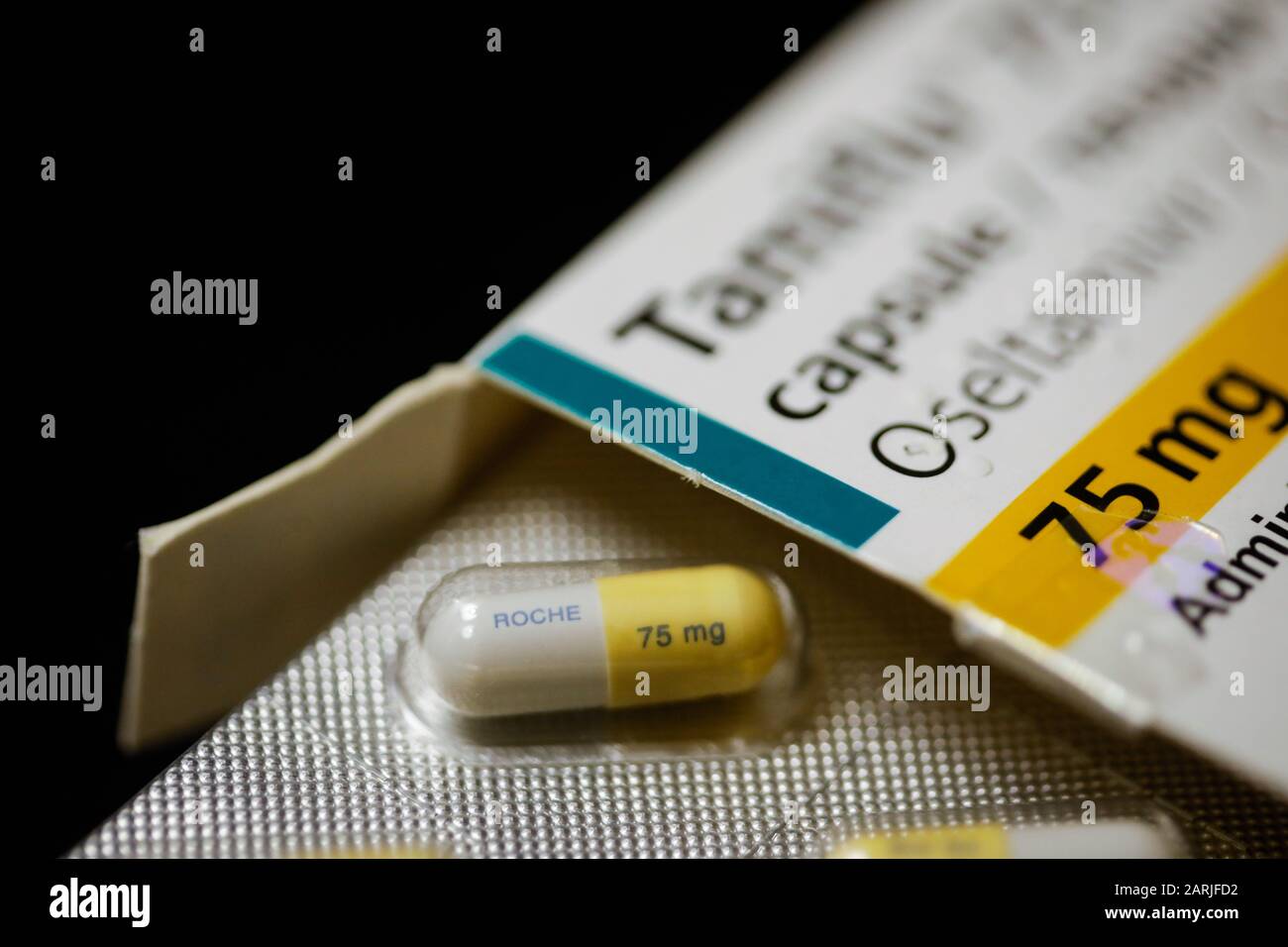 Bucharest, Romania - January 26, 2020: Close up image with a Tamiflu capsule (oseltamivir) on a blister pack, an antiviral medication that blocks the Stock Photo