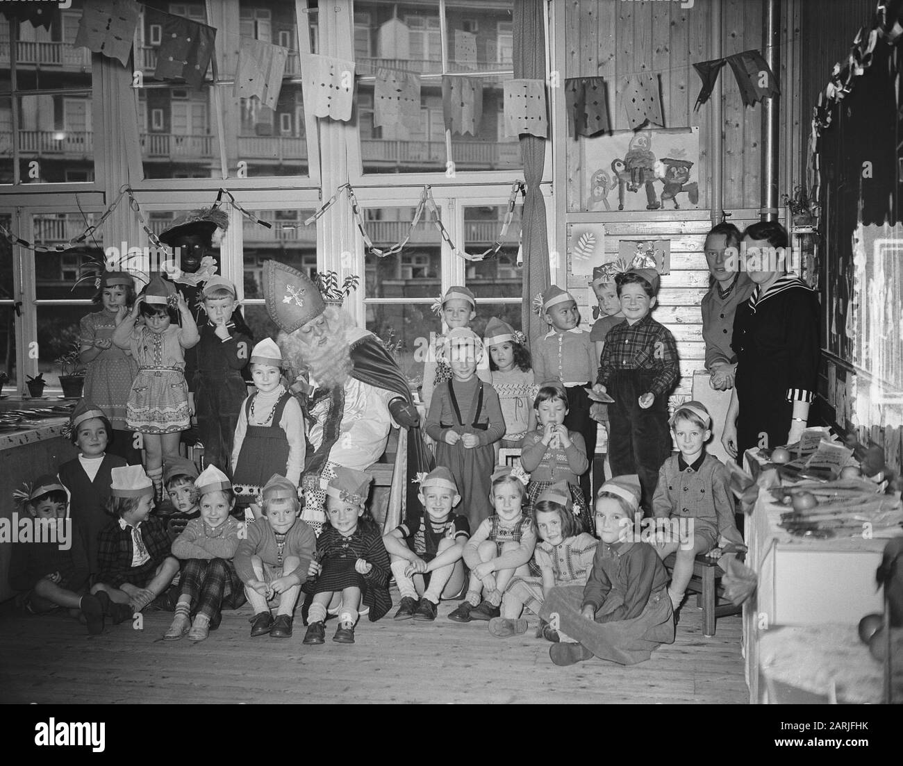 Sint Nicolaasfeest school Uiterwaardenstraat Amsterdam Date: December 3, 1954 Location: Amsterdam, Noord-Holland Keywords: Sinterklaas Stock Photo