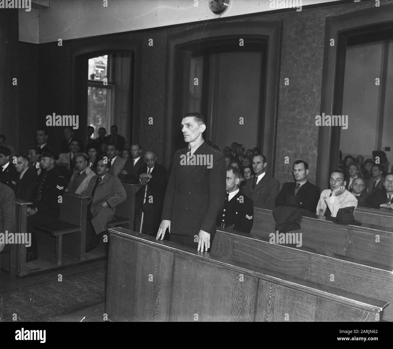 Sam Oly in the accused bank Date: October 3, 1947 Keywords: accused banks Personal name: Sam Oly Stock Photo