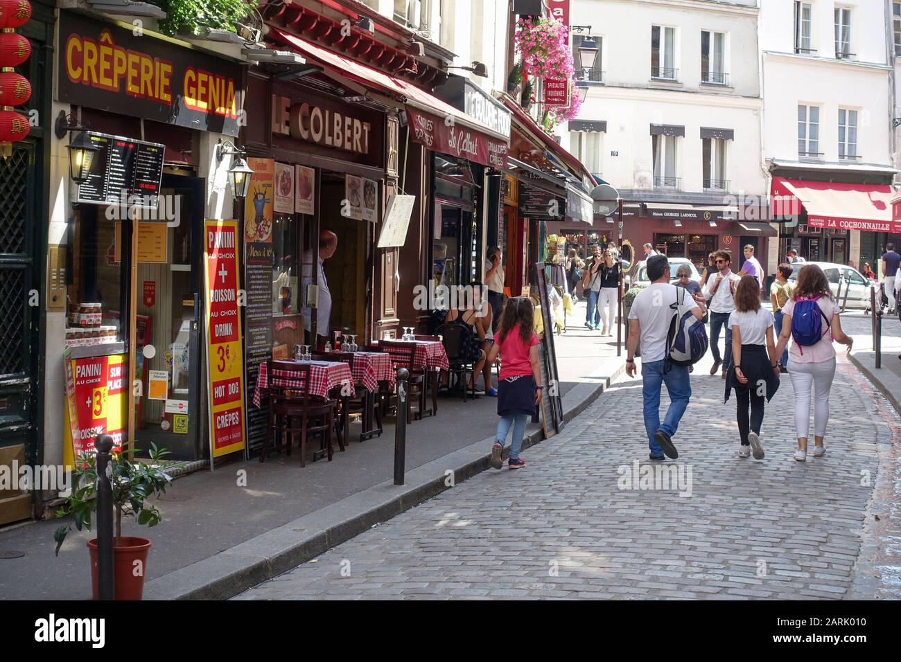 Restaurant and cafés at Junction of Rue de la Harpe and Rue Saint-Sevérin in the Latin Quarter, Paris, France Stock Photo