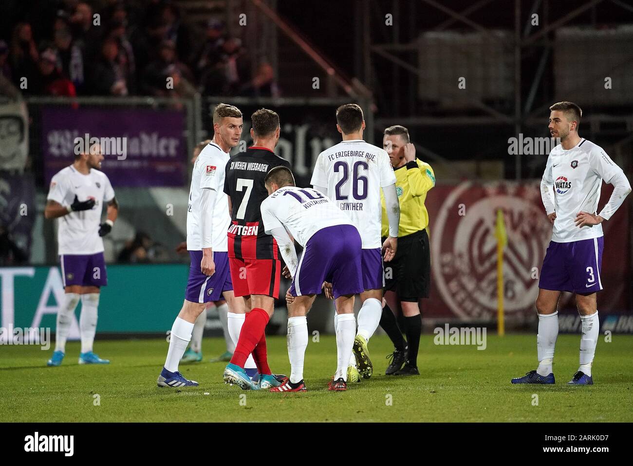 Wiesbaden, Germany. 28th Jan, 2020. Football: 2nd Bundesliga, SV Wehen Wiesbaden - Erzgebirge Aue, 19th matchday. The players from Aue are standing on the field after the defeat. Credit: Hasan Bratic/dpa - IMPORTANT NOTE: In accordance with the regulations of the DFL Deutsche Fußball Liga and the DFB Deutscher Fußball-Bund, it is prohibited to exploit or have exploited in the stadium and/or from the game taken photographs in the form of sequence images and/or video-like photo series./dpa/Alamy Live News Stock Photo