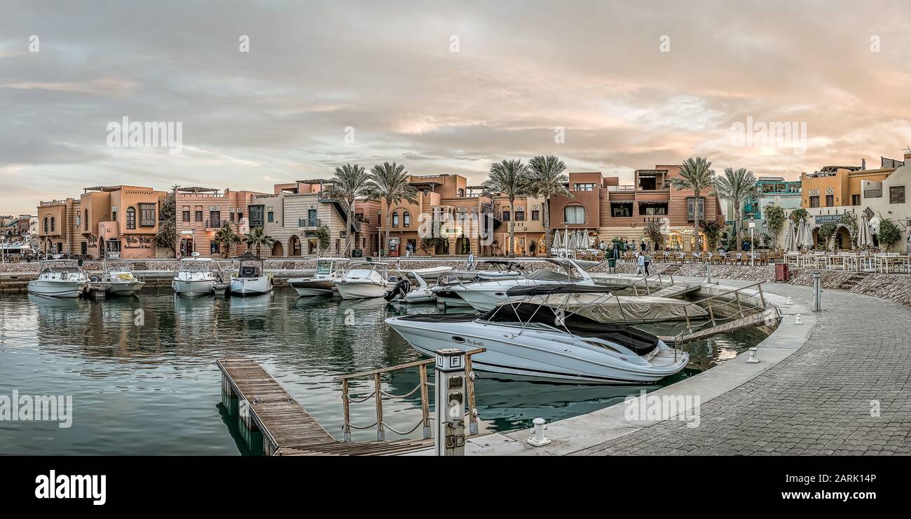 motor boats at anchor by the quay in the evening sun at Abu tig marina in el Gouna, Egypt, January 14, 2020 Stock Photo