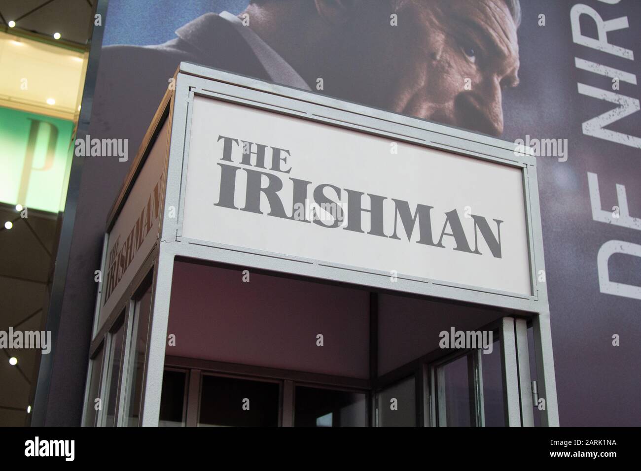 Phone cabine with the logo of The Irishman in Netflix event. Stock Photo