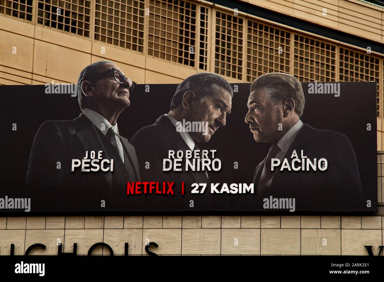 The Irishman billboard that shows Joe Pesci, Robert De Niro and Al Pacino on a shopping mall. Stock Photo