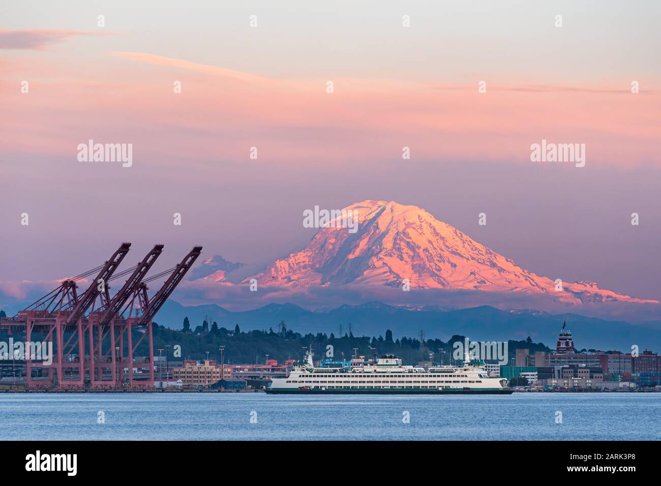 Washington State Ferry crossing Puget Sound at twilight with Mt Rainier ...