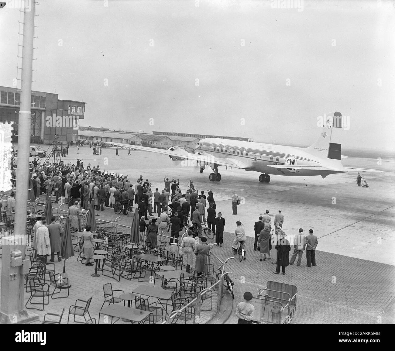 Departure KLM DC 6A Liftmaster Dr. Ir. M.A. Damme to Christchurch. Participant in the London-Christchurch Canterbury Centennial Air Race. Date: October 2, 1953 Location: Noord-Holland, Schiphol Keywords: aviation, airplanes, airports Personal name: DC6a Liftmaster Institution name: KLM Stock Photo