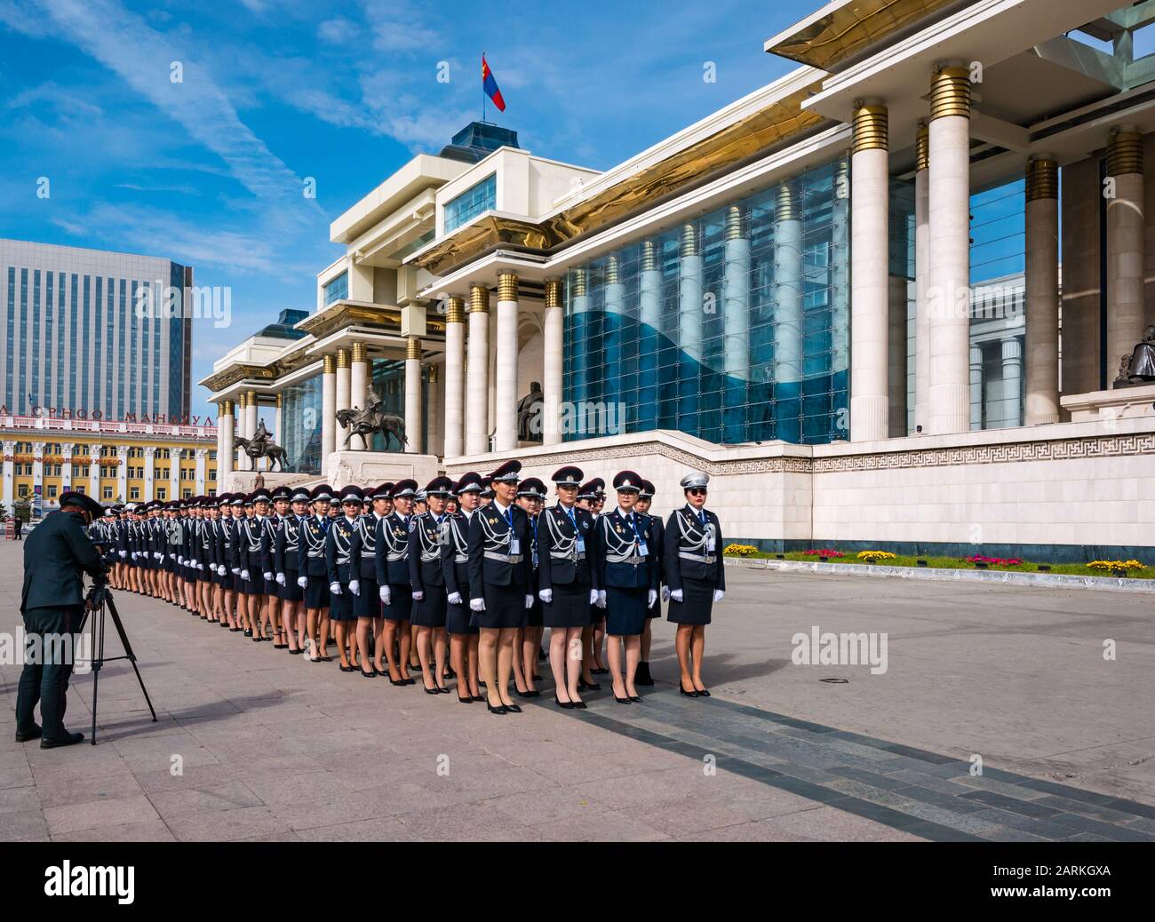 Female police officers marching ceremonial parade at Government Palace, Sükhbaatar Square, Ulaanbaatar, Mongolia Stock Photo