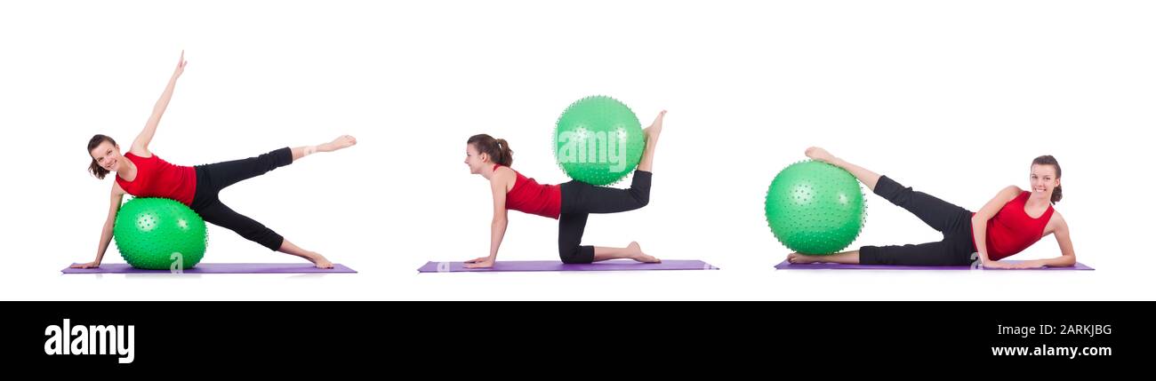 The young woman exercising with swiss ball Stock Photo - Alamy