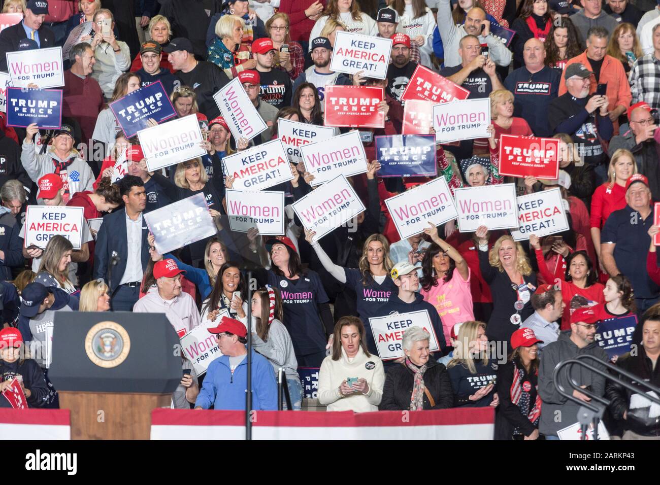 Wildwood, USA, 28th Jan 2020, Enthusiastic audience members hold various signs up at President Trump Rally, Photo Credit: Benjamin Clapp/Alamy Live News Stock Photo