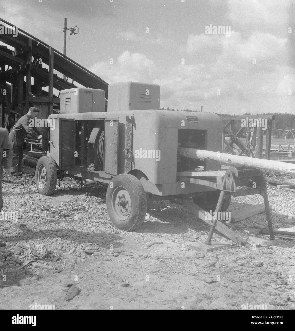 woodworking, workers, machines, logs Date: undated Keywords: workers, logs, woodworking, machines Stock Photo