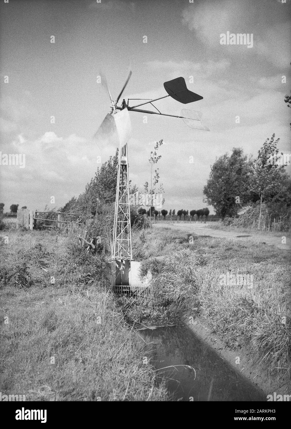poldering and bemaling, land plots, windmills Date: October 1952 Location: Ammerzoden, Hedel Keywords: poldering and bemaling, land plots, windmills Stock Photo