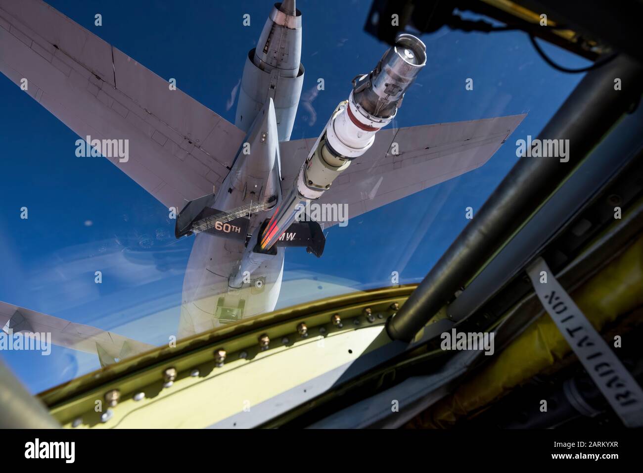 A U.S. Air Force 96th Bomb Squadron pilot positions a U.S. Air Force 2nd Bomb Wing B-52H Stratofortress behind a U.S. Air Force 60th Air Mobility Wing KC-10 Extender over Saudi Arabia in support of Bomber Task Force Europe 20-1, Nov. 1, 2019. The Stratofortress conducted a sortie to the U.S. Central Command area of operations in order to conduct interoperability training with Saudi partners in support of shared regional security interests. (U.S. Air Force photo by Tech. Sgt. Christopher Ruano) Stock Photo