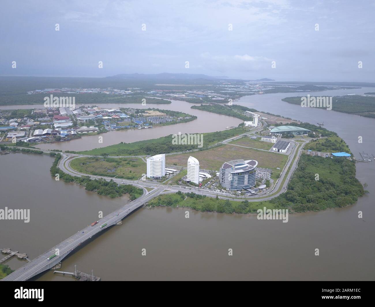 Aerial view of a barrage at the Kuching Isthmus island, with ships