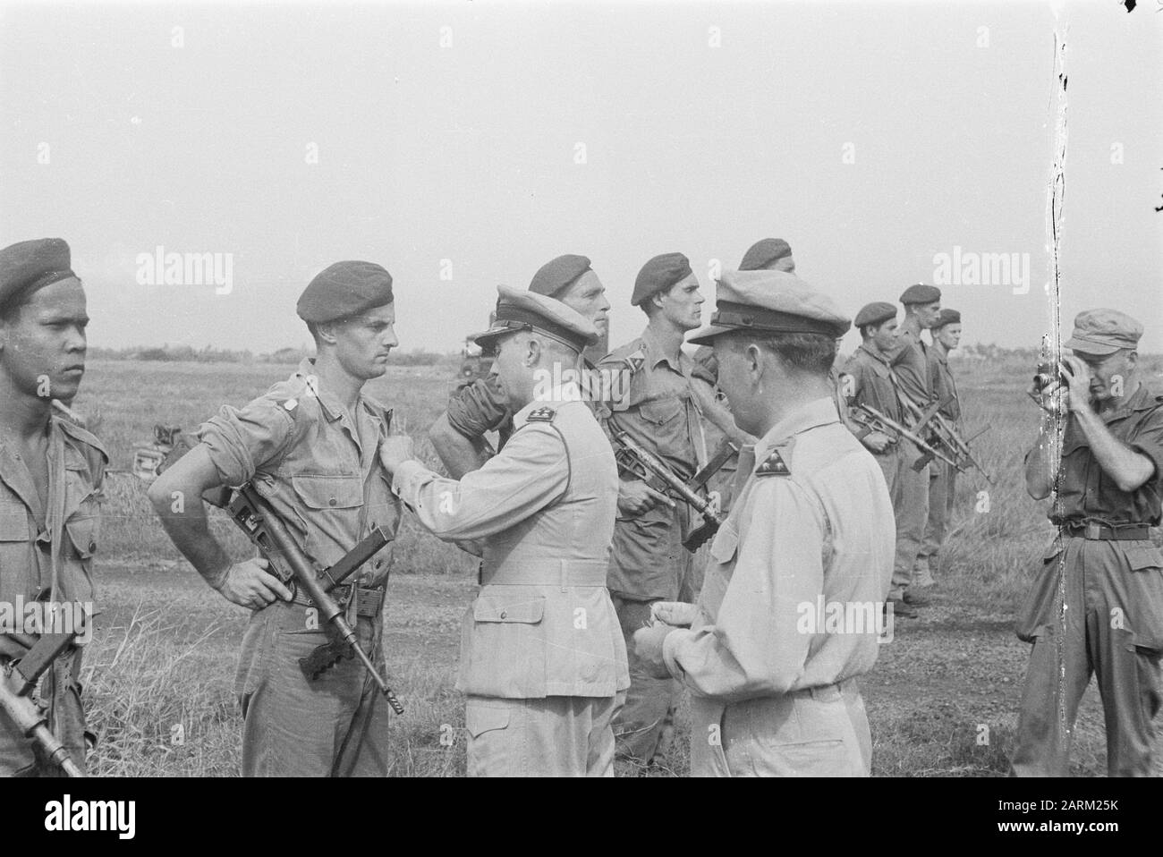 School for the Training of Parachutists at Kemajoran airport in Batavia  Skill test. Wings ceremony by Major General E. Engles Date: July 3, 1947 Location: Batavia, Indonesia, Java, Dutch East Indies Stock Photo