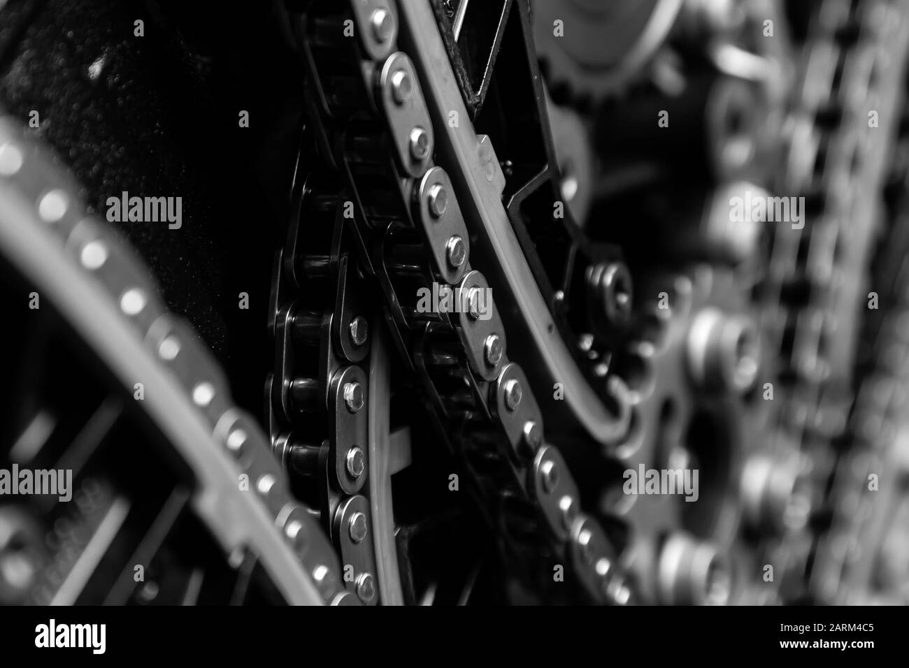 Gear, chain drive shaft in conveyor, belt is on production line. Timing