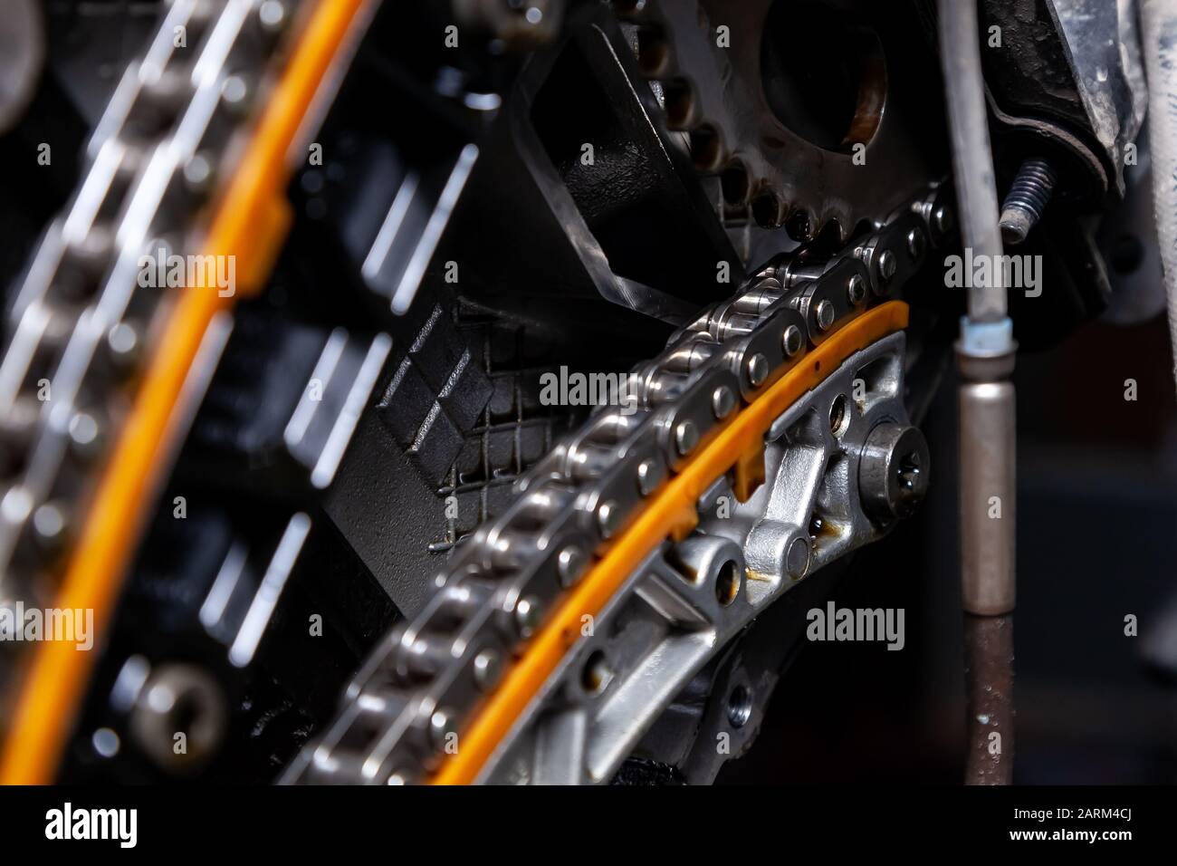 Gear, chain drive shaft in conveyor, belt is on production line. Timing chain of car, tensioners