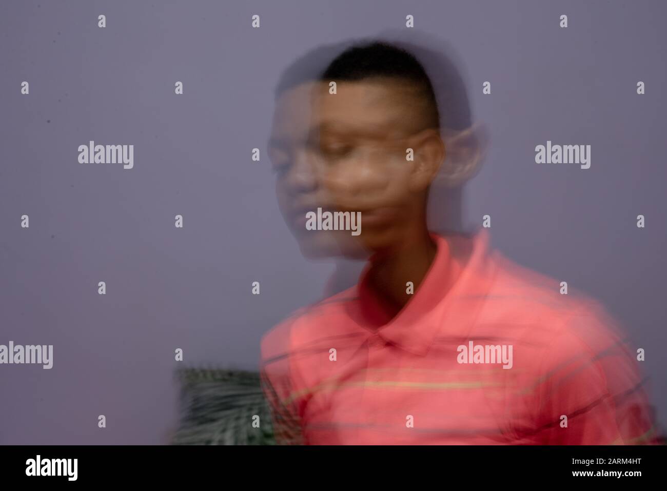 Close up portrait of young mans face with motion blur Stock Photo - Alamy