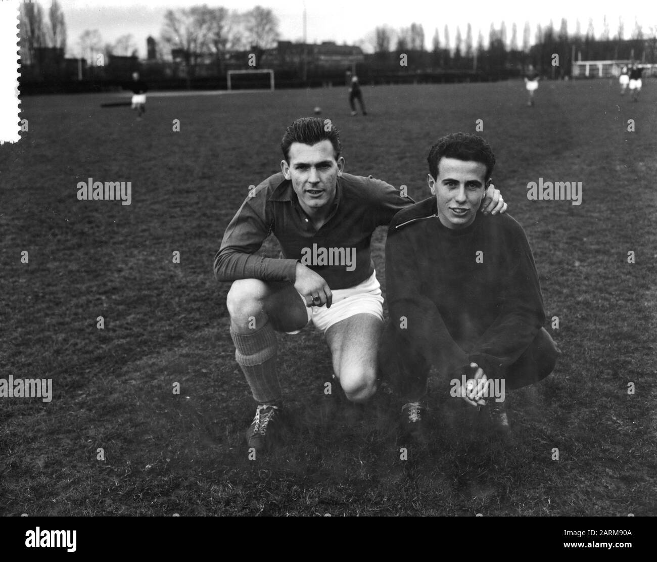 Voeballers: Leo Canjels (left) and French Architect Annotation: Both played for NAC from Breda.Leo Canjels was (for the 2nd time) selected for the Dutch team and would make his debut in the match against Bulgaria on 10 May 1951, French Architect would also make his debut in an interland against West Germany in a few months later Date: 14 April 1959 Keywords: portraits, sports, football, footballers Personname: Architect, Frans, Canjels, Leo Stock Photo